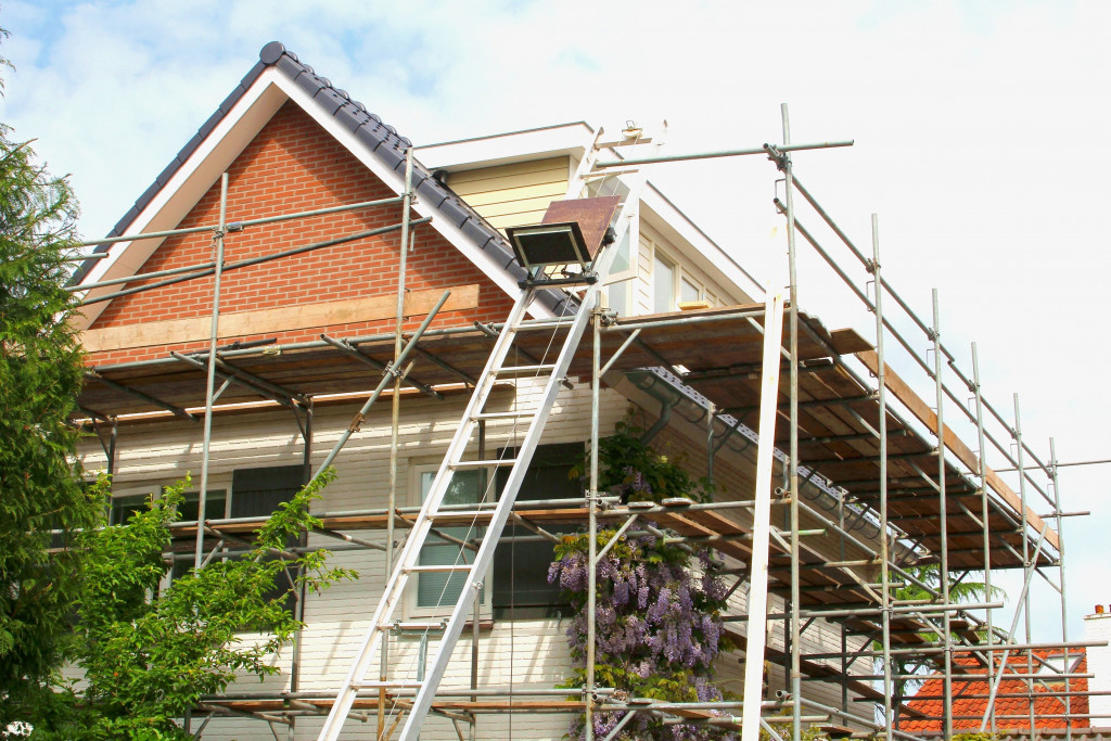 old house with structural frames in the exteriors under renovation