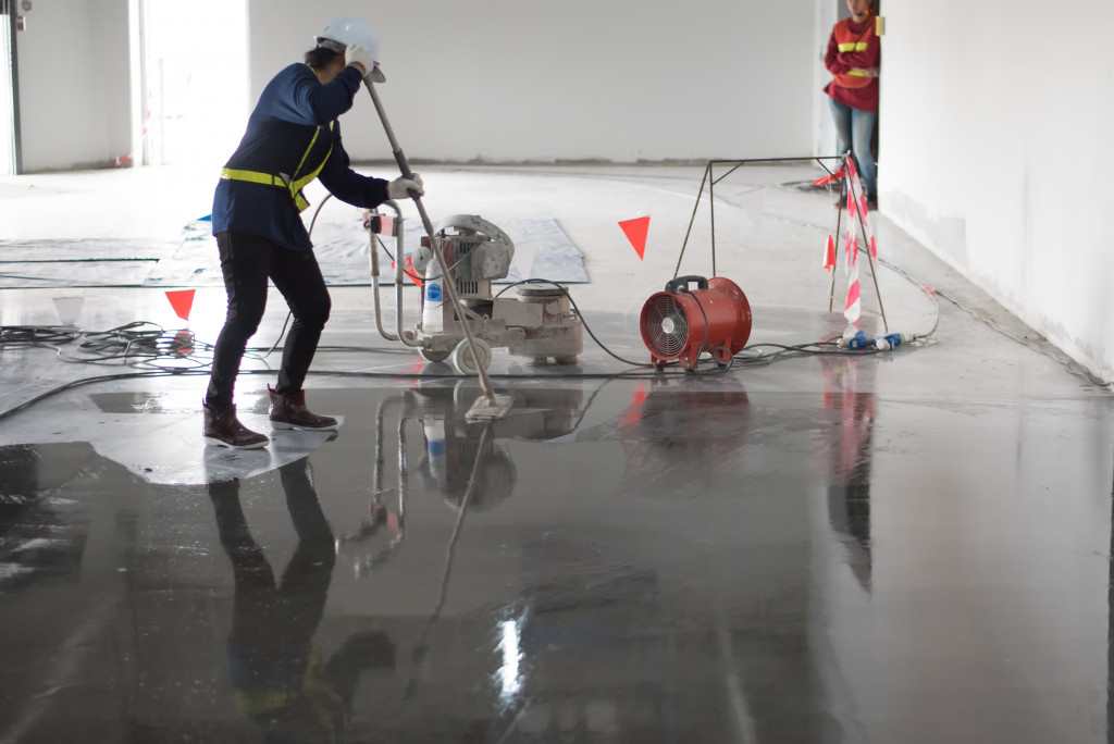 man cleaning a facility