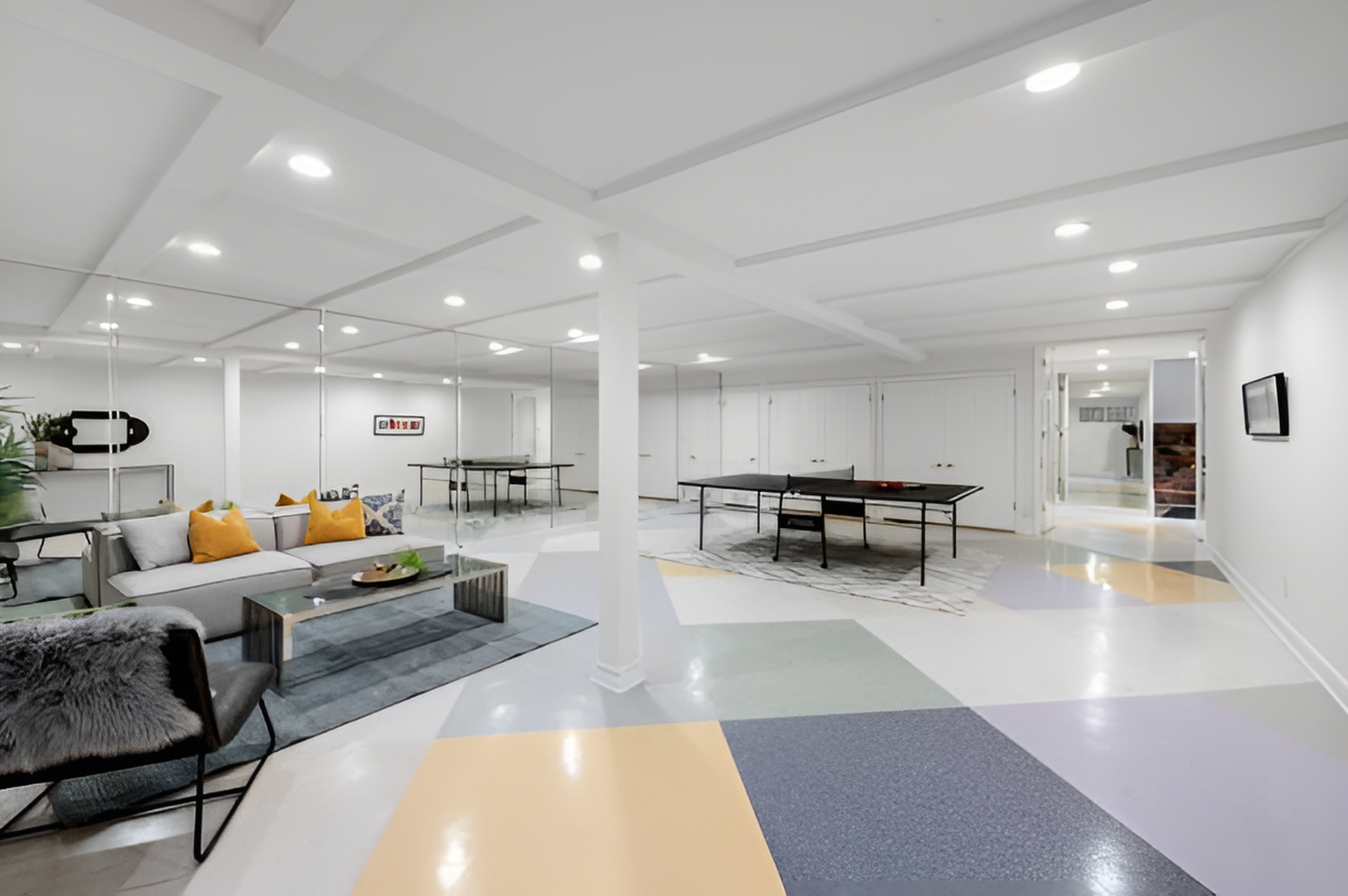 basement entertainment room featuring a pingpong table and a lounge area